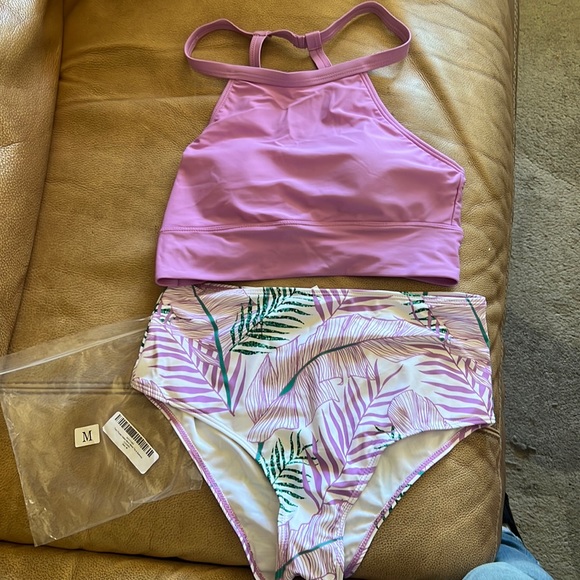 Halter top and bottom bikini size medium purple tone. New never worn in pkg. - Picture 1 of 2
